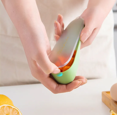 Peeler with Peel-Catching Storage Tube – No Mess on the Counter