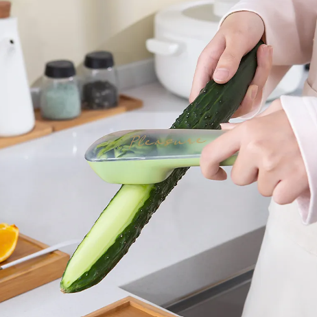 Peeler with Peel-Catching Storage Tube – No Mess on the Counter