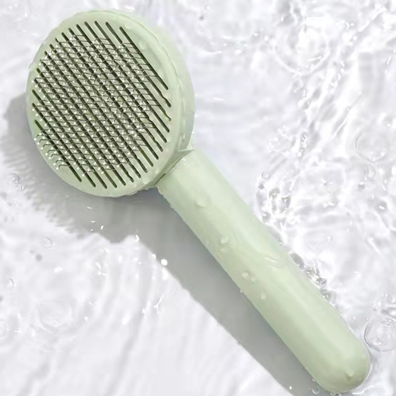 Self-Cleaning Slicker Brush – One Press and the Fur Lifts Right Off